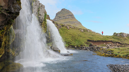 Image showing Kirkjufellsfoss waterfall near the Kirkjufell mountain, unrecogn