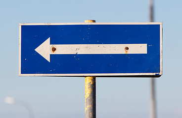 Image showing Traffic sign arrow pointing left, sign on an abandoned Amarican 