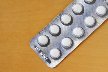 Image showing Pack of white pills