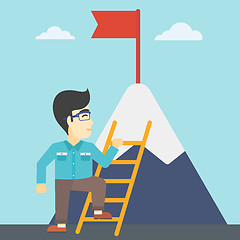 Image showing Businessman climbing on mountain.