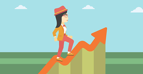 Image showing Business woman running along the growth graph.