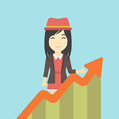 Image showing Business woman with growing chart.