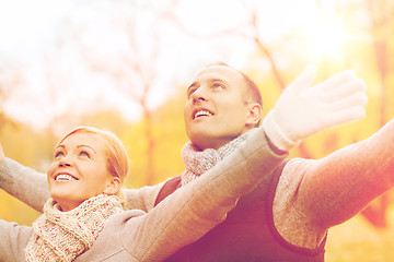 Image showing smiling couple in autumn park