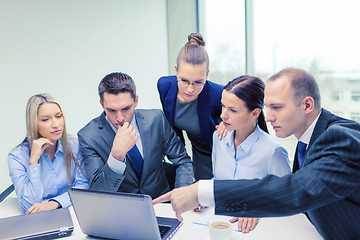 Image showing business team with laptop having discussion