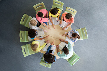 Image showing group of international students pointing finger