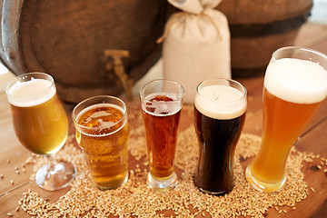 Image showing close up of beer barrel, glasses and bag with malt