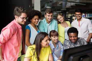 Image showing international students with computers at library