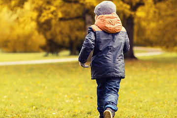 Image showing little boy running outdoors