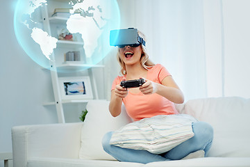 Image showing woman in virtual reality headset with controller