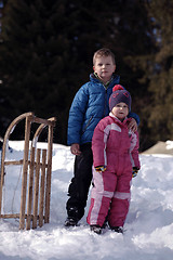 Image showing Brother and sister portrait in winter time