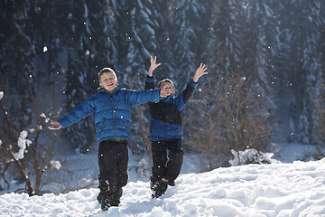 Image showing kids playing with  fresh snow