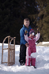 Image showing Brother and sister portrait in winter time