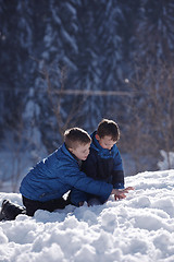 Image showing kids playing with  fresh snow