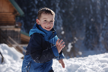 Image showing kids playing with  fresh snow