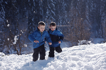 Image showing kids playing with  fresh snow