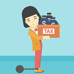 Image showing Chained business woman with bags full of taxes.