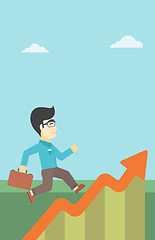 Image showing Businessman running along the growth graph.