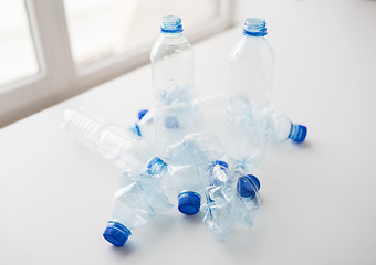 Image showing close up of empty used plastic bottles on table