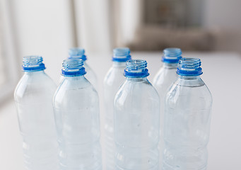 Image showing close up of bottles with drinking water on table