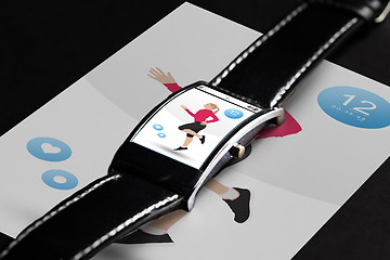 Image showing close up of black smart watch with fitness app