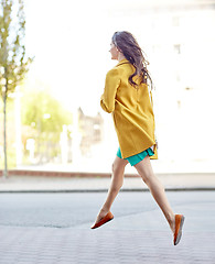 Image showing young woman or teenage girl legs on city street