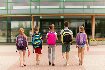 Image showing group of happy elementary school students walking