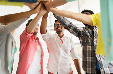 Image showing group of international students making high five