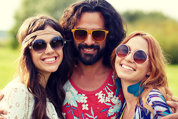 Image showing smiling young hippie friends outdoors