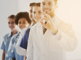 Image showing close up of doctors showing ok sign at hospital