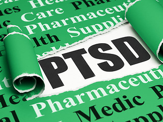 Image showing Healthcare concept: black text PTSD under the piece of  torn paper