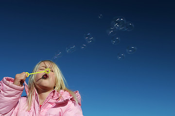 Image showing bursting bubbles