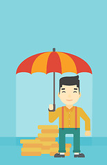 Image showing Businessman with umbrella protecting money.