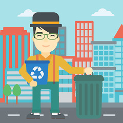 Image showing Man with recycle bin and trash can.