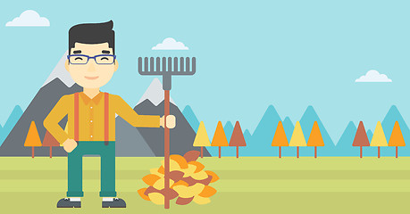 Image showing Man raking autumn leaves vector illustration.