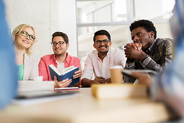 Image showing group of high school students sitting at table