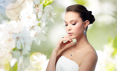 Image showing beautiful woman with earring, ring and pendant