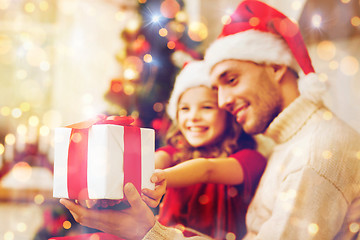 Image showing close up of father and daughter with gift box