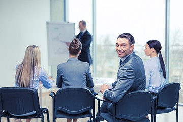 Image showing businessman with team in office