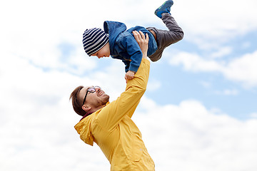 Image showing father with son playing and having fun outdoors