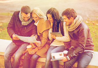 Image showing couples with tourist map in autumn park