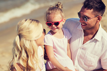 Image showing happy family in sunglasses on summer beach