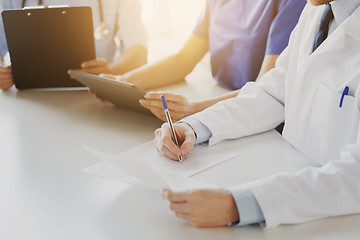 Image showing close up of happy doctors at seminar or hospital