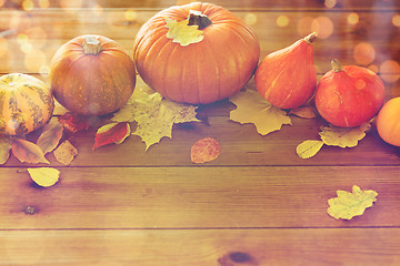 Image showing close up of pumpkins on wooden table at home