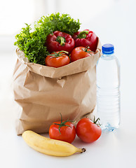 Image showing close up of bag with friuts, vegetables and water