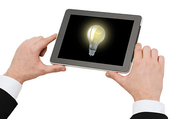 Image showing close up of man hands holding tablet pc