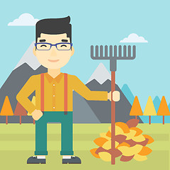 Image showing Man raking autumn leaves vector illustration.