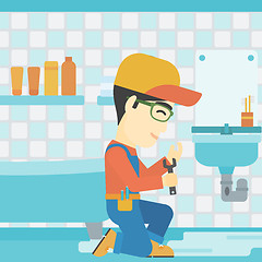 Image showing Man repairing sink.