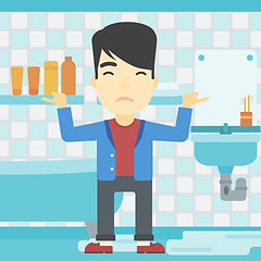 Image showing Man in despair standing near leaking sink.