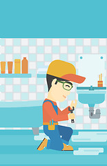 Image showing Man repairing sink.