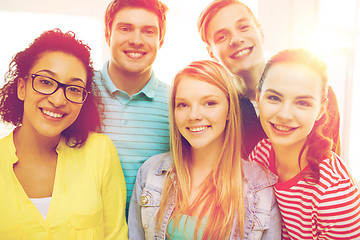 Image showing group of smiling people at school or home